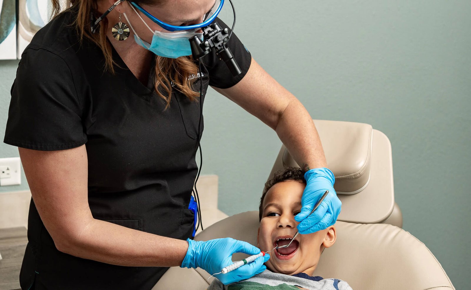 Dentist Treating a Child